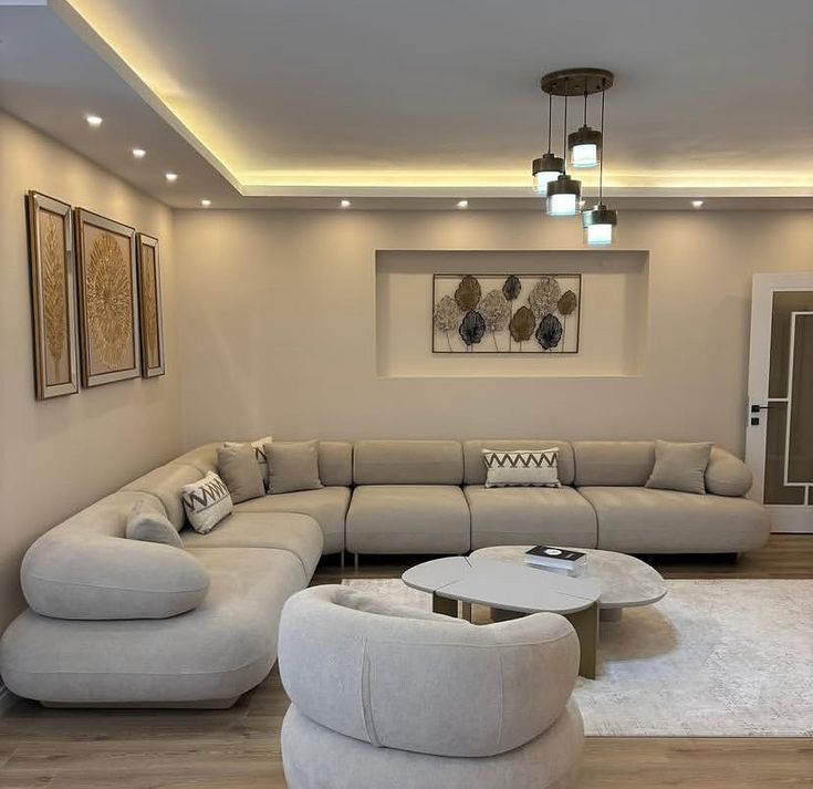 Modern living room sofa design for home interiors in Hyderabad by HSIA